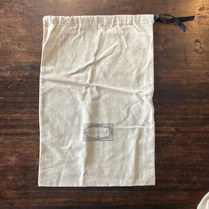 Vertical tan Gucci dust bag